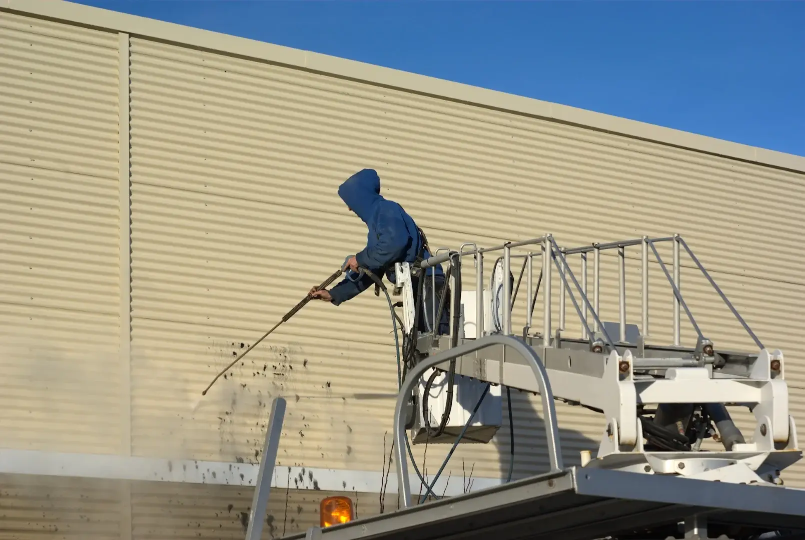 Commercial pressure washing on a concrete structure in Indianapolis