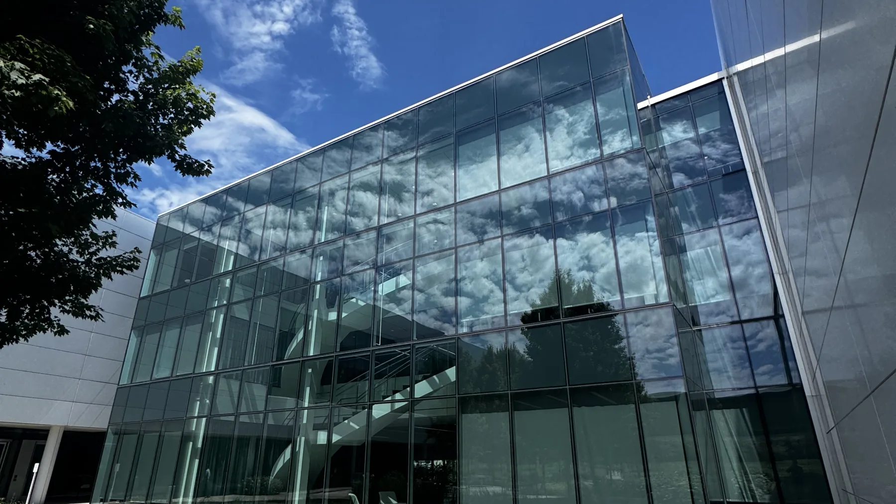 Commercial and Industrial Power Washing technician rappelling down a building Indianapolis Walden Window Pressure Washing